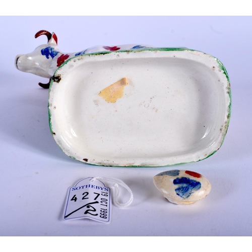 133A - A RARE EARLY 19TH CENTURY WELSH SWANSEA POTTERY COW CREAMER AND COVER C1810 painted with blue and re... 