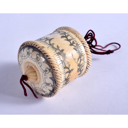 1331 - A BONE TAPE MEASURE. 4 cm x 3 cm.