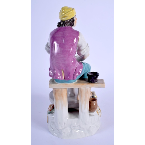 134 - AN EARLY 20TH CENTURY MEISSEN PORCELAIN FIGURE OF A POTTER modelled beside a potting wheel. 21 cm hi... 