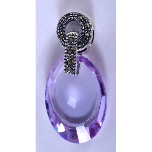 1347 - A SILVER AND AMETHYST PENDANT. 7.6 grams. 3.5 cm x 2 cm.