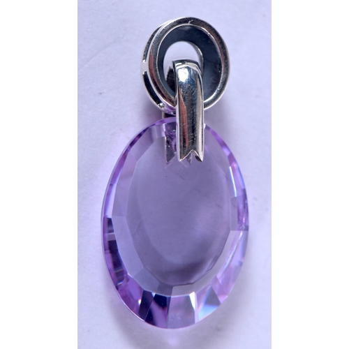 1347 - A SILVER AND AMETHYST PENDANT. 7.6 grams. 3.5 cm x 2 cm.