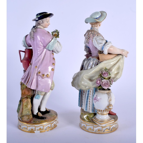 136 - A PAIR OF 19TH CENTURY MEISSEN PORCELAIN FIGURES OF A MALE AND FEMALE modelled holding flowers upon ... 