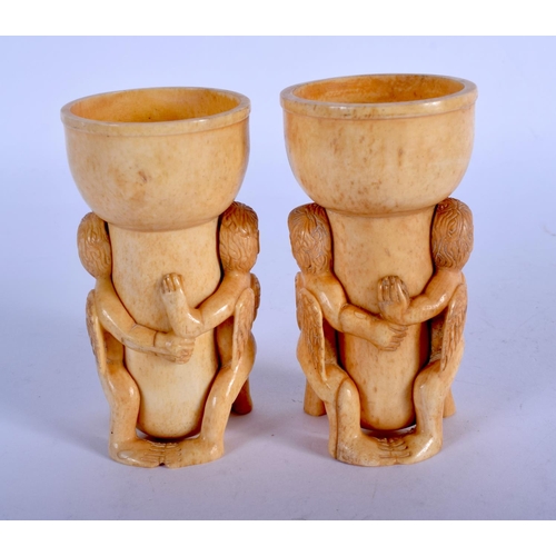 1379 - A PAIR OF CONTINENTAL BONE CANDLESTICKS. 10 cm high.