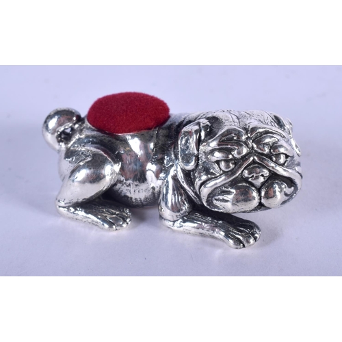 1387 - A SILVER BULLDOG PIN CUSHION. 16 grams. 5 cm x 2 cm.