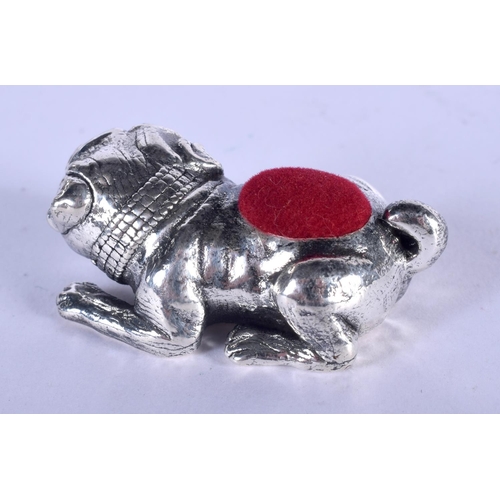 1387 - A SILVER BULLDOG PIN CUSHION. 16 grams. 5 cm x 2 cm.