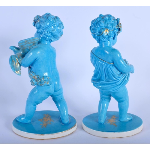 142 - A PAIR OF 19TH CENTURY SEVRES STYLE TURQUOISE BLUE GLAZED PORCELAIN FIGURES one modelled holding ber... 