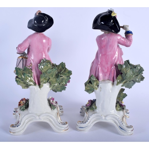 143 - A LARGE PAIR OF 19TH CENTURY CONTINENTAL PORCELAIN FIGURES modelled upon purple painted rococo bases... 