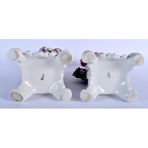 143 - A LARGE PAIR OF 19TH CENTURY CONTINENTAL PORCELAIN FIGURES modelled upon purple painted rococo bases... 