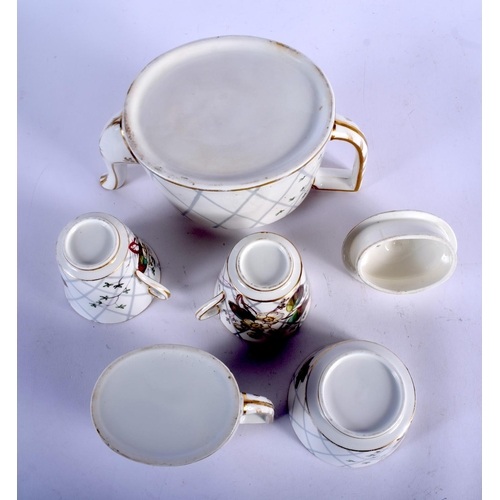 157 - AN AESTHETIC MOVEMENT PORCELAIN TEASET decorated with strawberry plants. Tray 40 cm x 28 cm. (8)