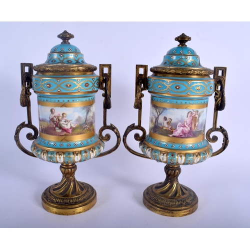 168 - A LARGE PAIR OF 19TH CENTURY FRENCH SEVRES PORCELAIN VASES AND COVERS painted with figures within la... 