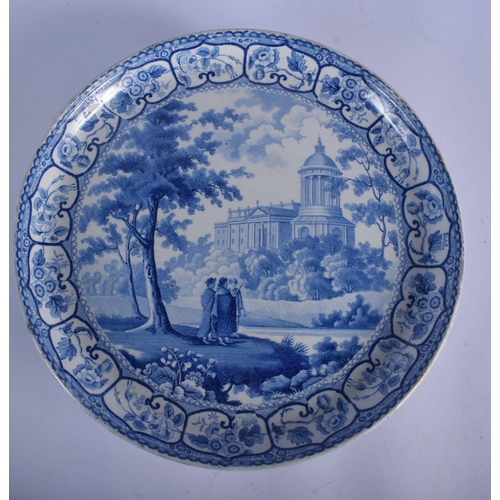 169 - TWO 19TH CENTURY ENGLISH STAFFORDSHIRE BLUE AND WHITE PLATTERS together with a pearl broth pot, a Mi... 