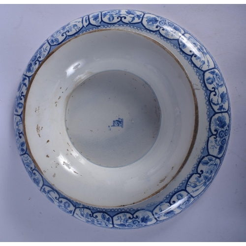 169 - TWO 19TH CENTURY ENGLISH STAFFORDSHIRE BLUE AND WHITE PLATTERS together with a pearl broth pot, a Mi... 