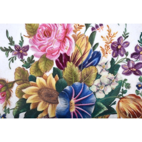 177 - A VICTORIAN PRINTED AND PAINTED PORCELAIN TILE decorated with urns of foliage. Tile 21 cm x 18 cm.