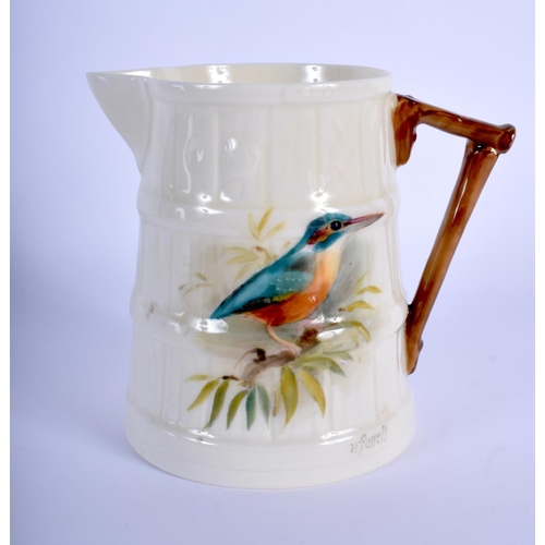 193 - Royal Worcester barrel shape moulded jug painted with a Kingfisher by W. Powell, signed, date code 1... 