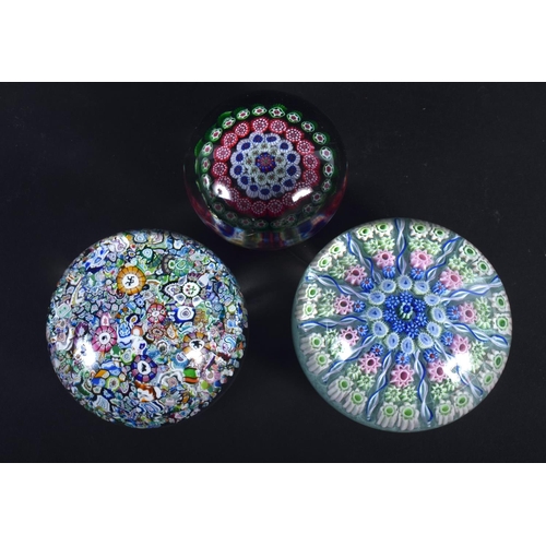 21 - THREE VINTAGE EUROPEAN GLASS PAPERWEIGHTS. Largest 6.75 cm diameter. (3)