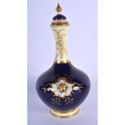 233 - Late 19th/early 20th c. Coalport vase and cover painted with a bird in landscape in a gilt panel on ... 