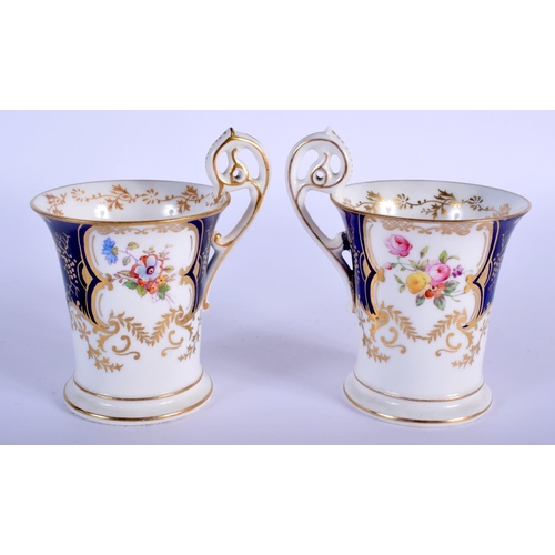 234 - Late 19th/early 20th c. Coalport pair of elegant Batwing blue ground coffee cups and saucers painted... 