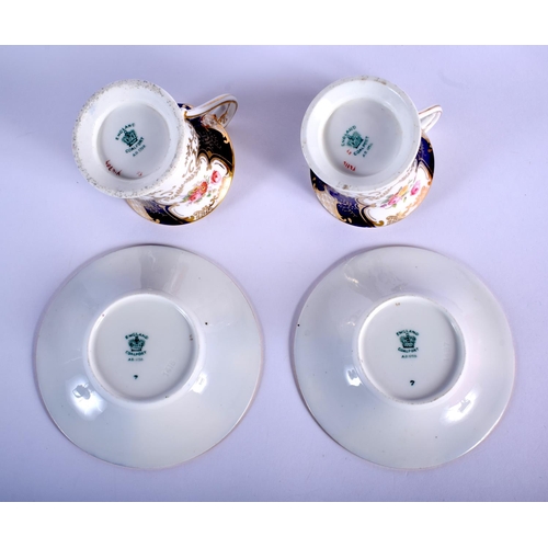 234 - Late 19th/early 20th c. Coalport pair of elegant Batwing blue ground coffee cups and saucers painted... 