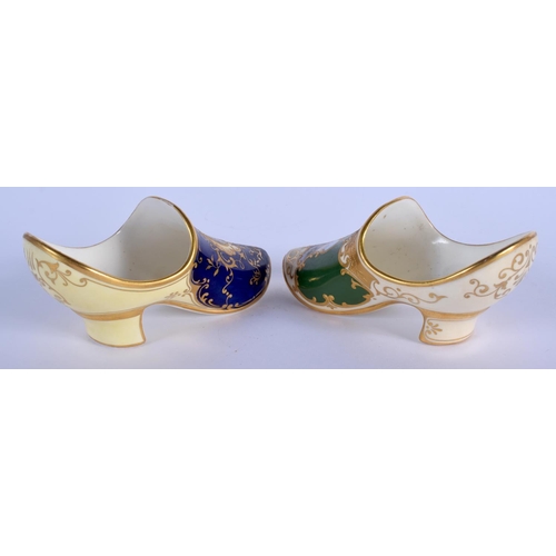 237 - Late 19th/early 20th c. Coalport miniature Dutch clog painted with a landscape in gilt panel on a ... 