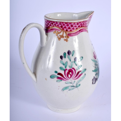 245 - 18th c. Worcester sparrow beak jug painted with a flower under a pink scale border.  10.5cm high