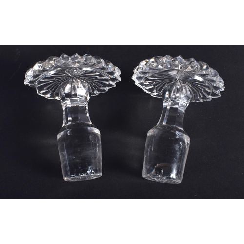 27 - A PAIR OF GEORGE III CUT GLASS DECANTERS. 22 cm high.