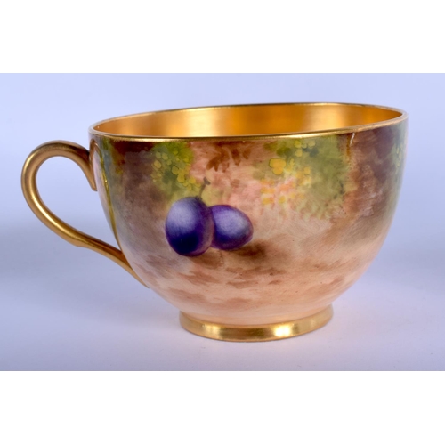 272 - Royal Worcester cup and saucer painted with fruit and berries on a mossy bank by Harry Ayrton and Wm... 