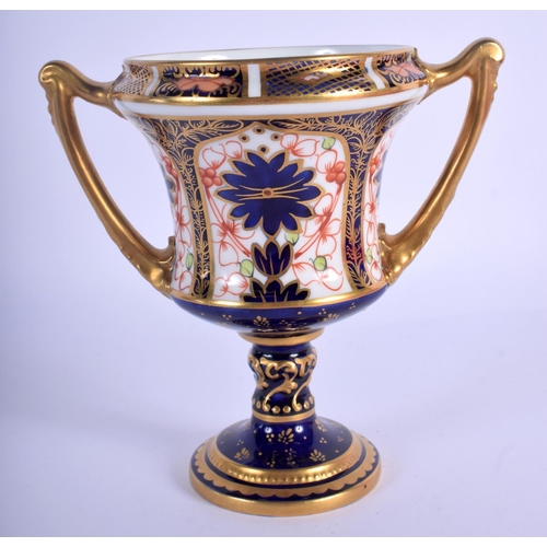 281 - Royal Crown Derby two handled vase painted with imari pattern 1128, date code 1915.  13cm high