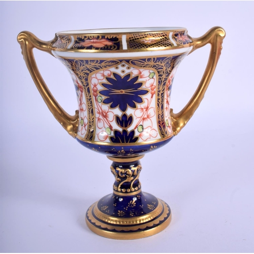 281 - Royal Crown Derby two handled vase painted with imari pattern 1128, date code 1915.  13cm high