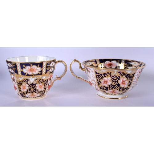 284 - Royal Crown Derby teacup 5.5cm high, saucer 15cm diameter and side plate in pattern 2451, date code ... 