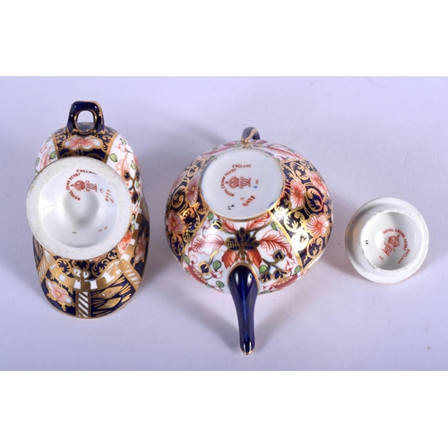 288 - Royal Crown Derby miniature teapot  and spoon stand painted with pattern 6299, date code 1907 & 1913... 