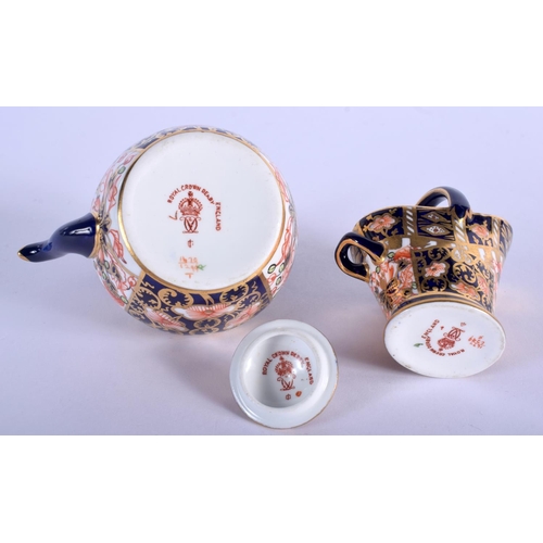 292 - Royal Crown Derby miniature kettle and coal scuttle painted with pattern 6299, date code 1914 & 1918... 