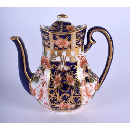 294 - Royal Crown Derby rare miniature coffee pot and cover painted with pattern 6299, date code 1913.  7.... 