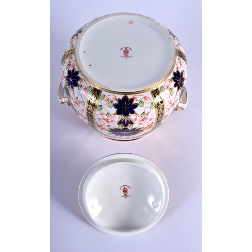 296 - Royal Crown Derby two handled jar and cover painted with pattern 1128, date code 1925.  15.5cm high ... 