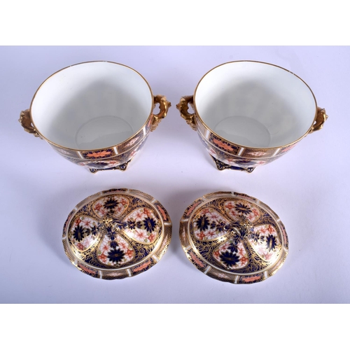 297 - Royal Crown Derby superb pair of two handled vases and covers painted with pattern 1128, date code 1... 