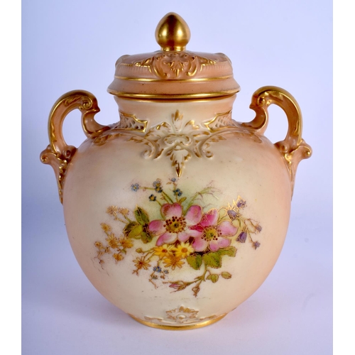 300 - Royal Worcester blush ivory two handled vase and cover painted with dog roses and wildflowers, date ... 