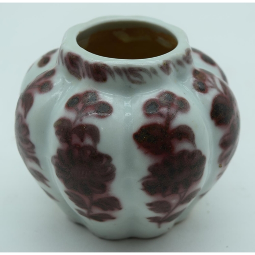 3158 - A small Chinese vase decorated with Foliage in relief 8 x 10cm.