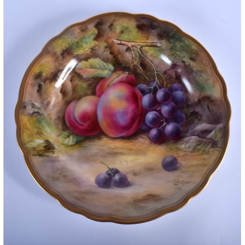 316 - Royal Worcester plate painted with plums and grapes by T. Lockyer, signed, date mark 1922.  23cm dia... 