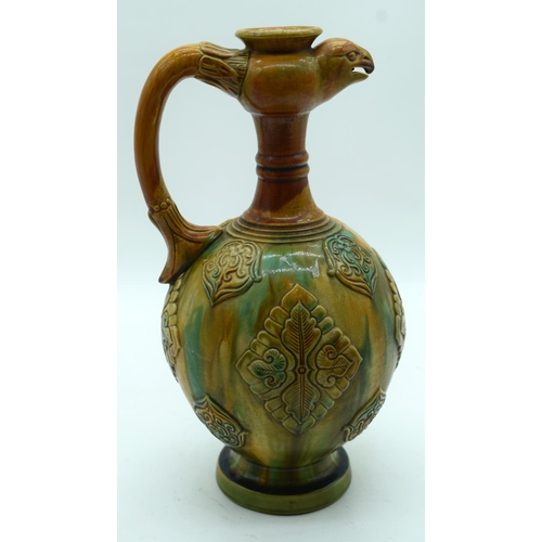 3164 - A Chinese wine vessel with a birds head handle 36 x 18cm.