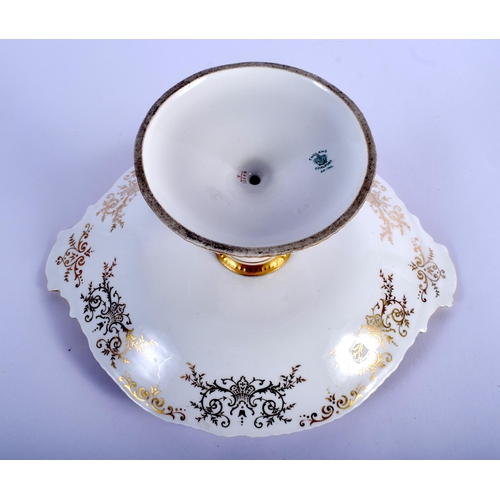 320 - Late 19th / Early 20th c. Coalport comport painted with a bird under a blue and gilt border and five... 