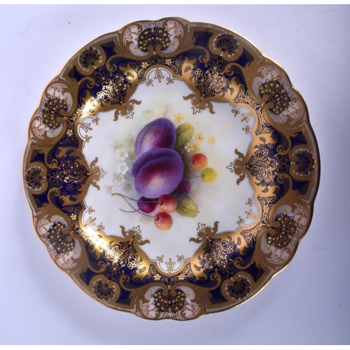 329 - Royal Worcester plate painted with fruit under a blue border by A. Shuck, signed, date mark 1922.  2... 