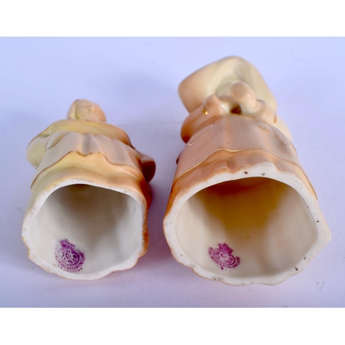 334 - Royal Worcester two blush ivory candlesnuffer: French Cook, date mark 1912, Nun date mark 1919.  9.5... 