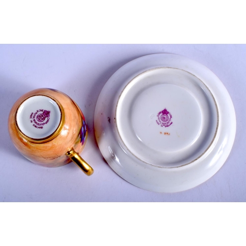 347 - Royal Worcester coffee cup and saucer painted with fruit, the cup signed  A. Shuck, date mark 1940. ... 