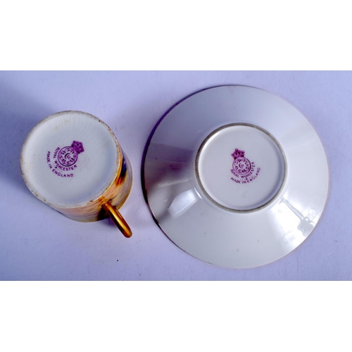 355 - Royal Worcester coffee can and saucer painted with fruit by W. H. Austin, signed, date mark 1922.  C... 