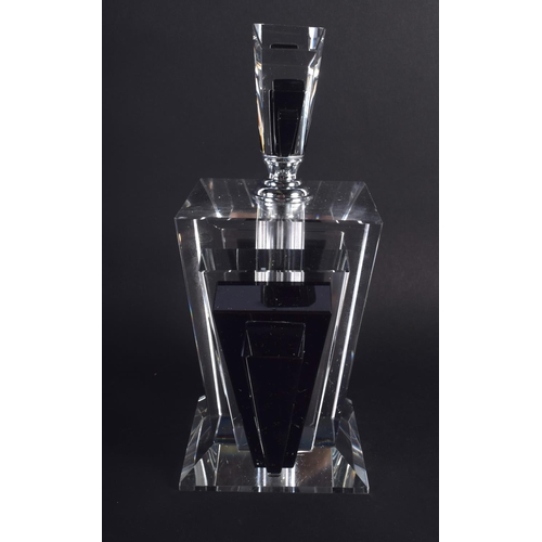 37 - AN ART DECO STYLE BLACK AND CLEAR GLASS SCENT BOTTLE. 24 cm x 13 cm.