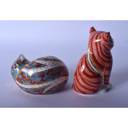 412 - Royal Crown Derby paperweight of a seated kitten and a sleeping kitten.  8.5cm high (2)