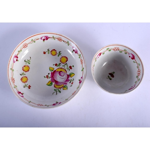 426 - AN 18TH CENTURY ENGLISH PEARLWARE TEABOWL AND SAUCER painted with flowers. 8 cm diameter.