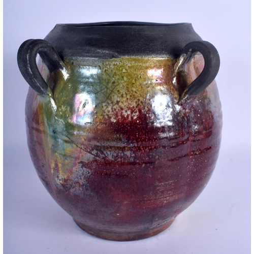 428 - A STUDIO POTTERY METALLIC GLAZED FLAMBE TYPE VASE. 24 cm x 12 cm.