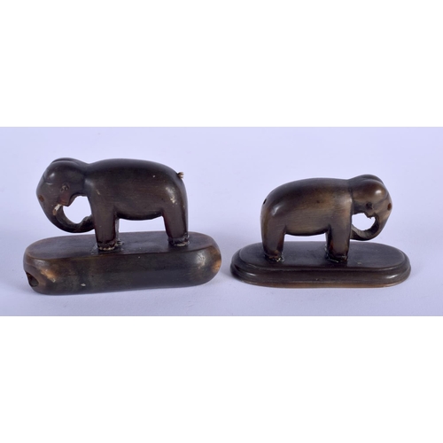 485 - A RARE PAIR OF 19TH CENTURY MIDDLE EASTERN CARVED RHINOCEROS HORN ELEPHANTS modelled upon oval bases... 