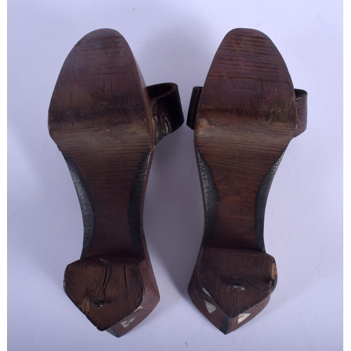 504 - A PAIR OF ANTIQUE MIDDLE EASTERN TURKISH MOTHER OF PEARL INLAID BATH SHOES. 20 cm x 8 cm.