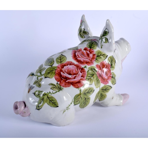 52 - A LARGE VINTAGE SCOTTISH WEYMSS STYLE PIG painted with floral sprays. 36 cm x 25 cm.